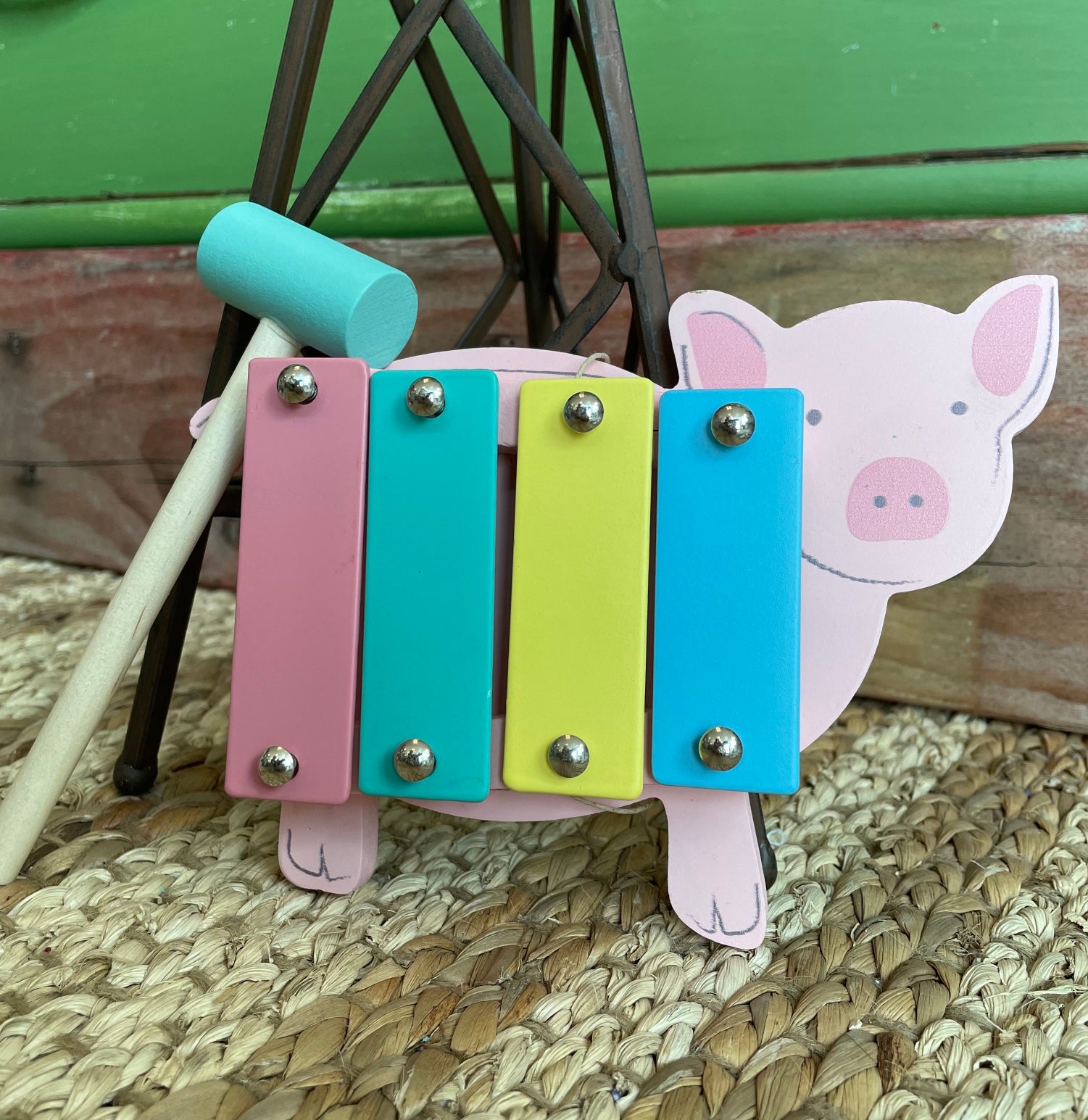 mini pig xylophone with teal mallet