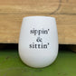 "sippin' & sittin'" white stemless silicone wine glass