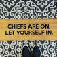 "Chiefs Are On. Let Yourself In." Coir fiber doormat with black lettering