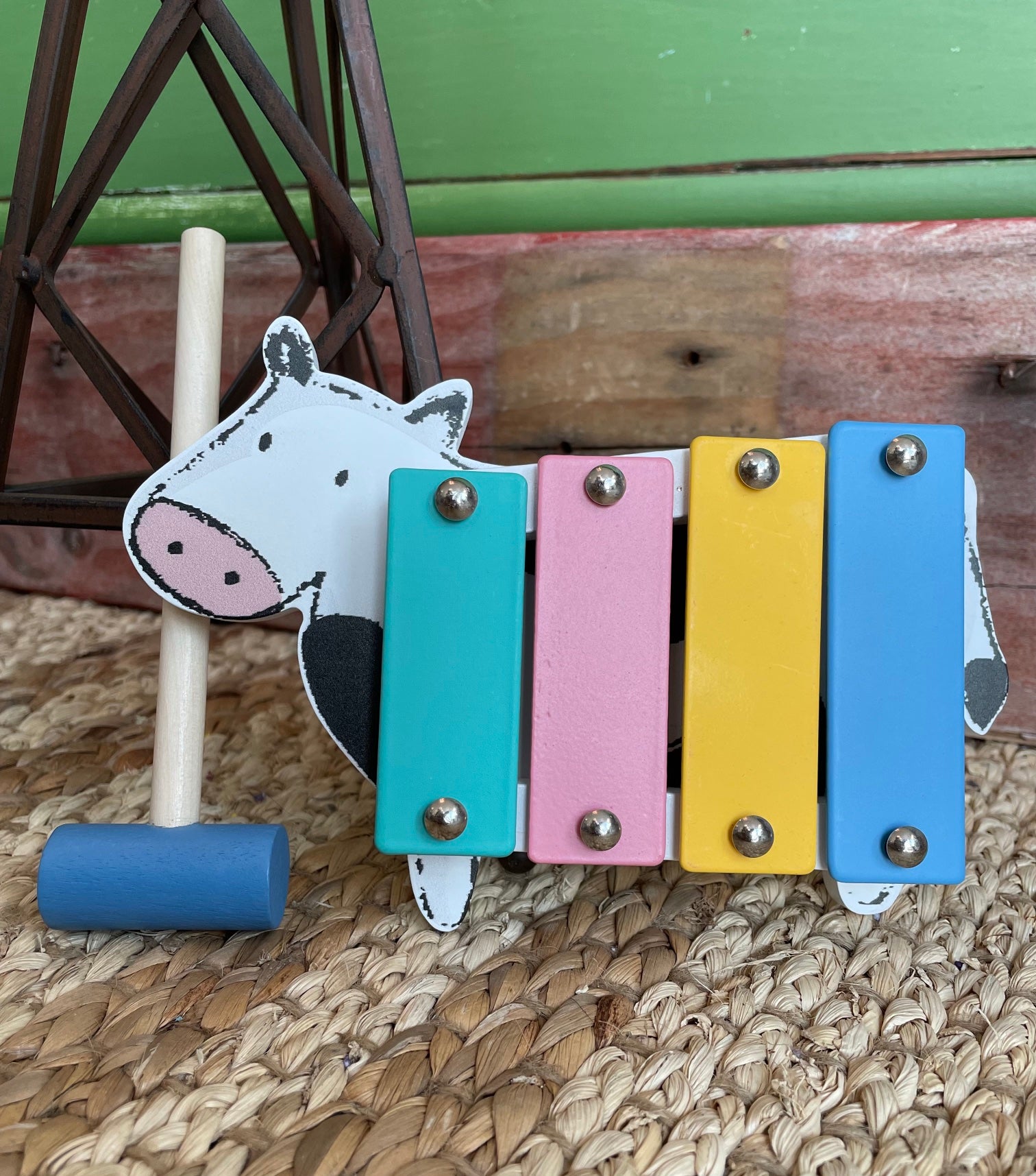 mini cow xylophone with blue mallet