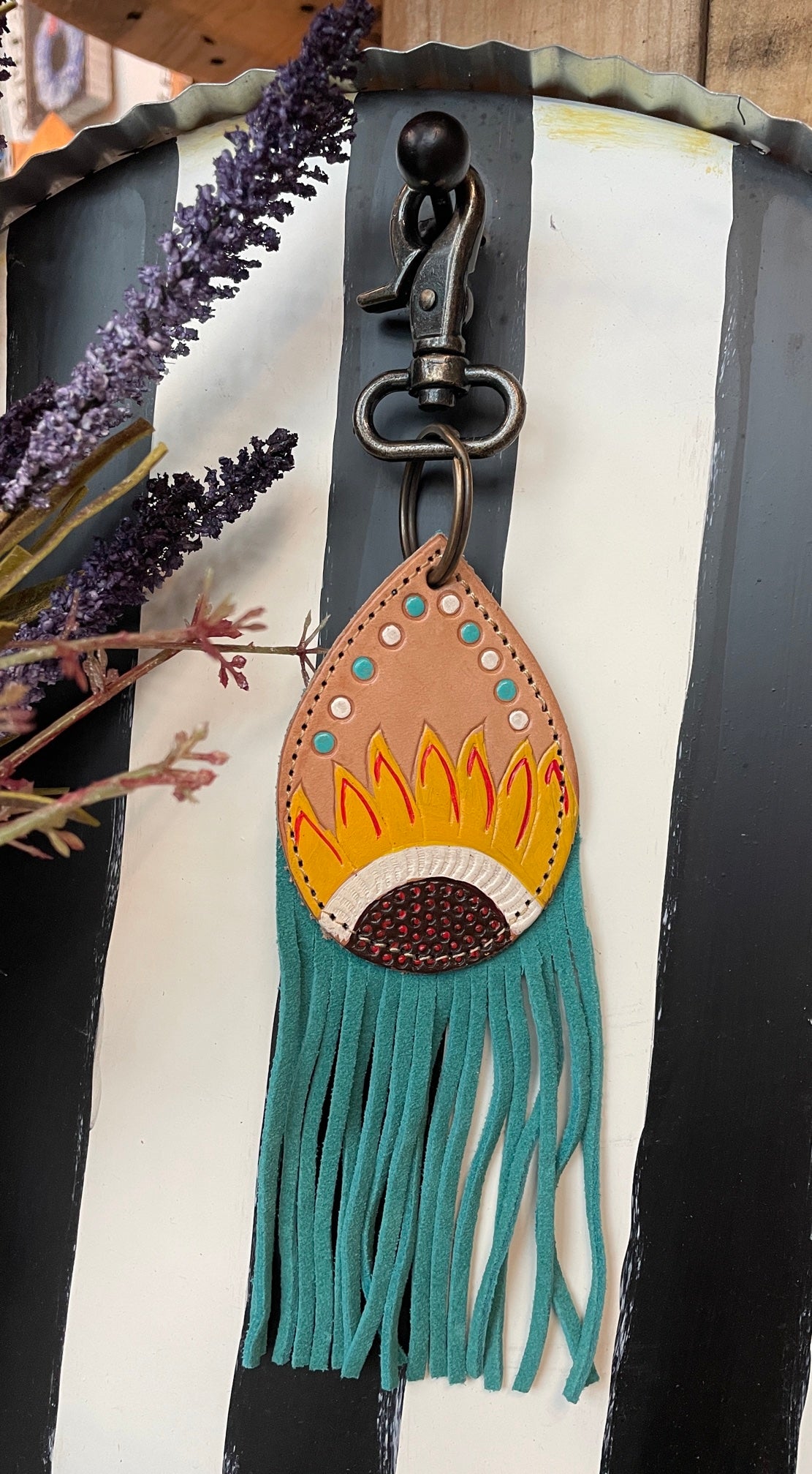Leather and suede teardrop keychain with sunflower