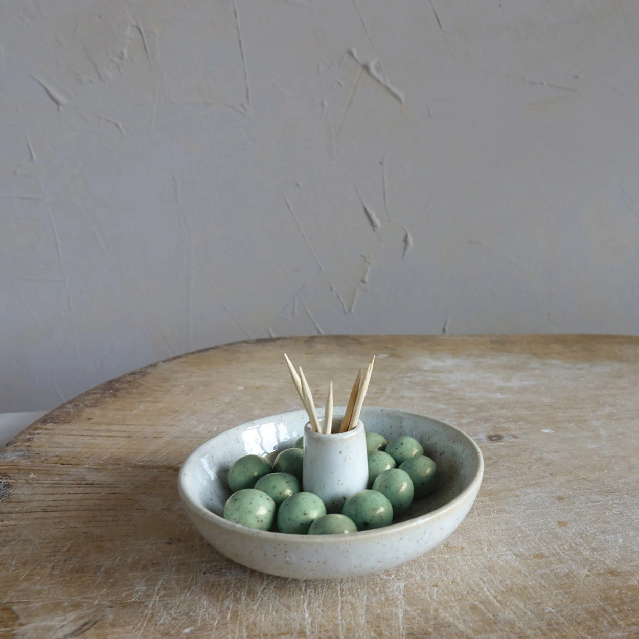 stoneware toothpick and olive dish