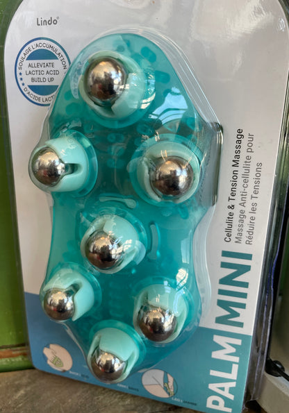 teal handheld mini tension massager