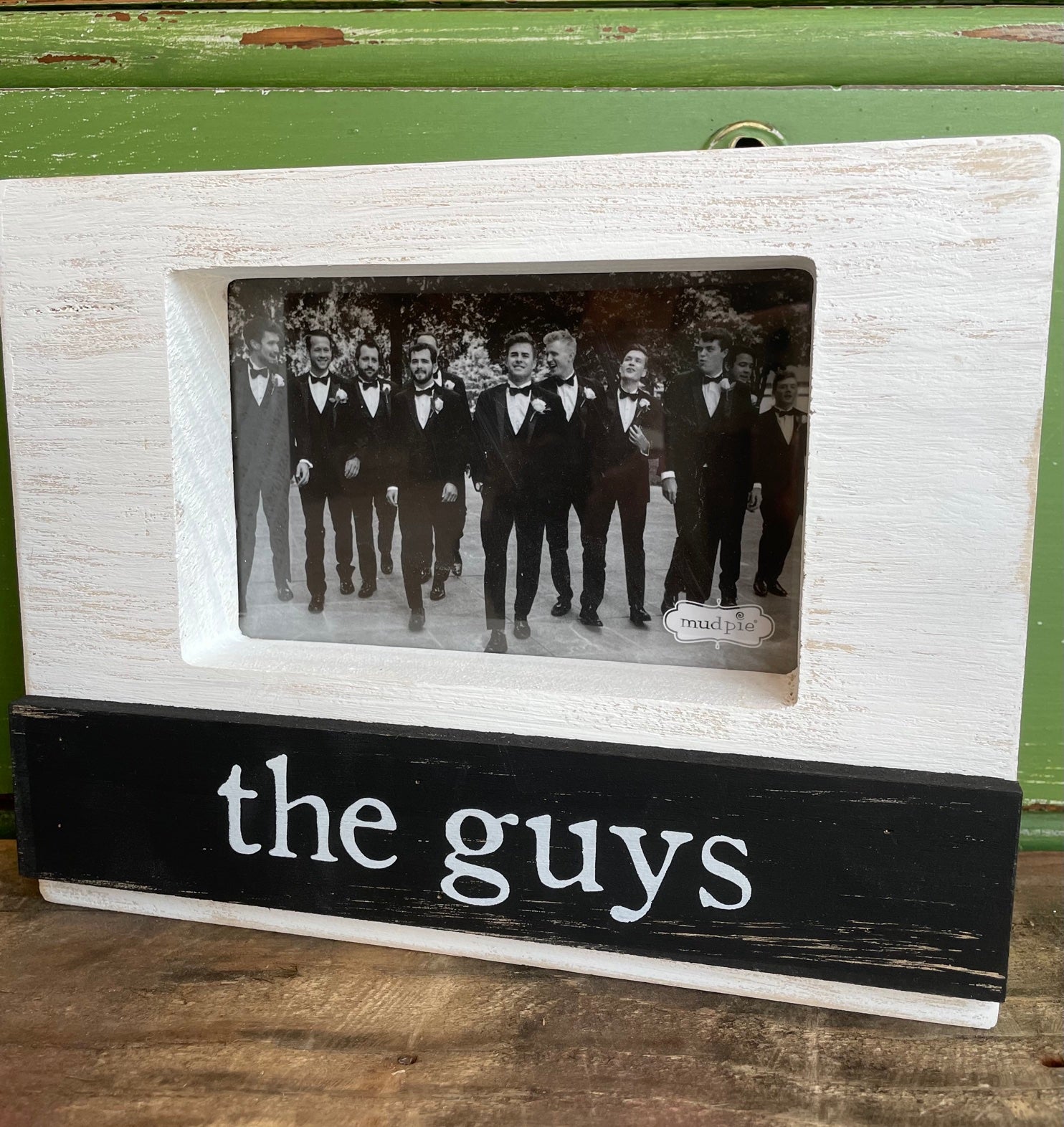 "the guys" white washed and black wood frame